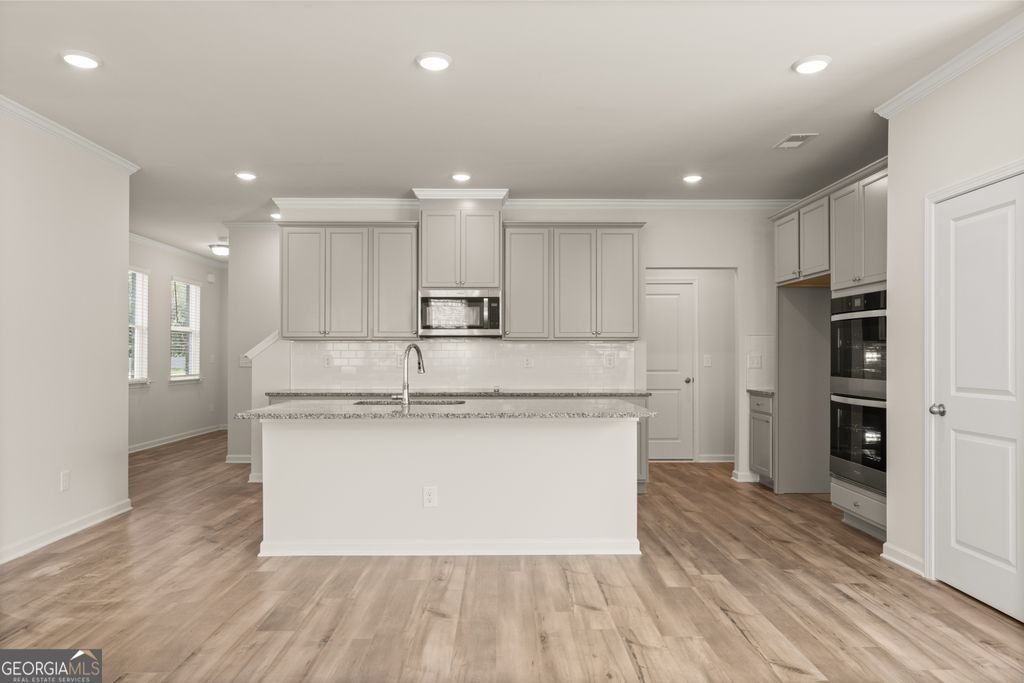 Photo of 732 Ellis Spring Way #LOT 70, Lawrenceville, GA 30045 (MLS # 10678773)