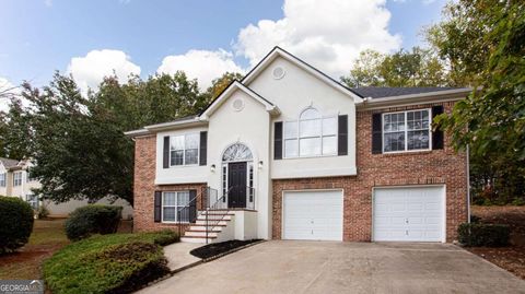 Photo of 5619 Wandering Vine Lane SE, Mableton, GA 30126 (MLS # 10634923)