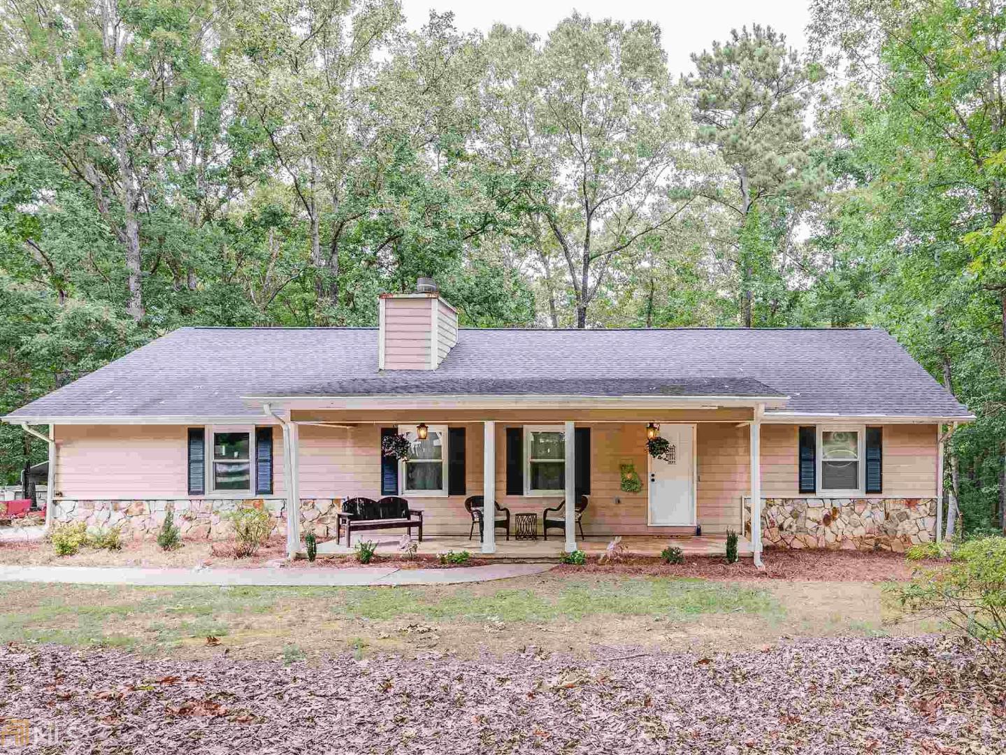 Cozy Ranch PERFECT for a family! This home is nestled away on a cul-de-sac, on a quiet street in an established neighborhood, yet close to shopping and interstate access! This home features 3 bedrooms and 2 bathrooms that have been recently updated with 2 acres of level and wooded land! Enjoy having a BBQ on the back deck or enjoy quiet evenings on the rocking chair front porch. Come check this one out today!