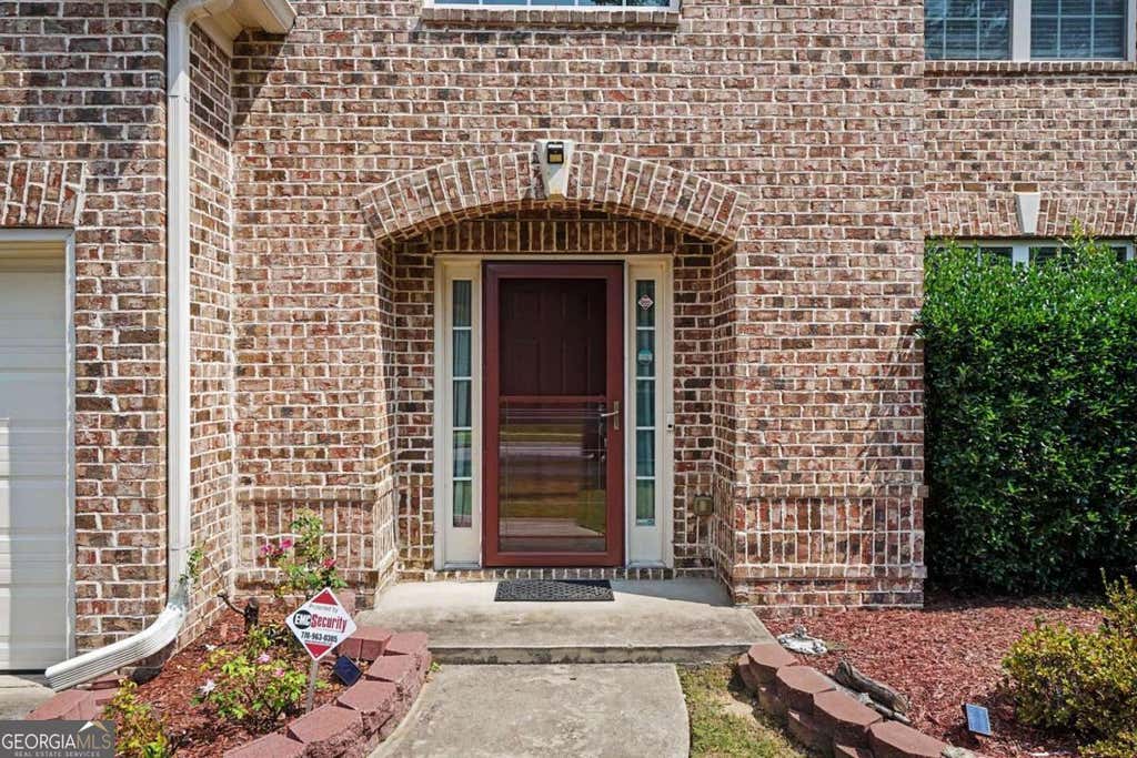 Photo of 542 Simonton Ridge, Lawrenceville, GA 30045 (MLS # 10817042)
