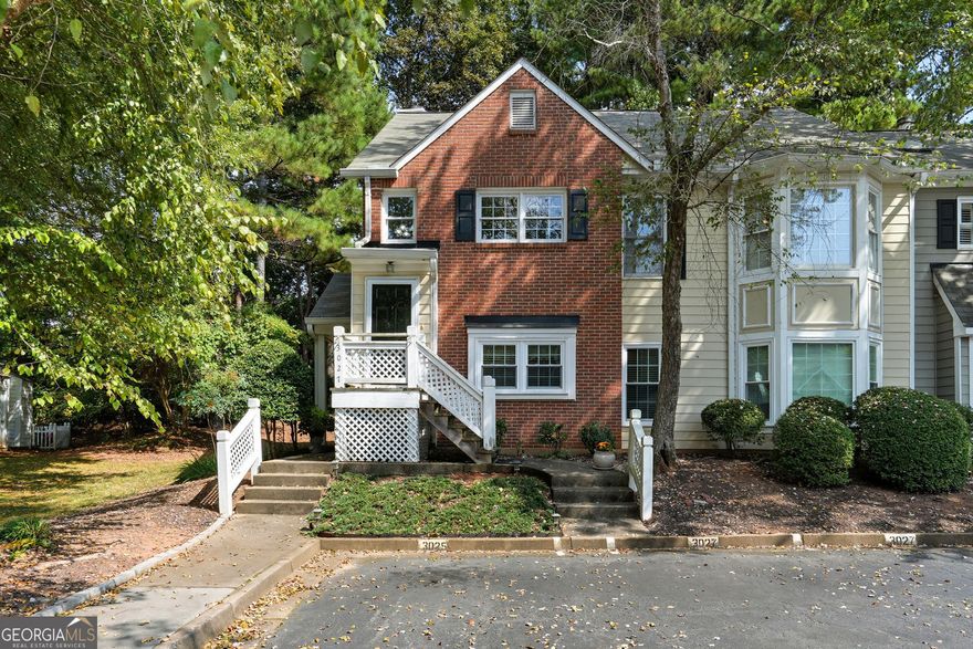 Discover unbeatable value in an incredible location just minutes from Avalon, downtown Alpharetta, and Halcyon. This top-floor end unit is full of natural light, accompanied by soaring vaulted ceilings, creating a bright, airy feel with no one above you. Step onto your private balcony off of the living area and enjoy a peaceful treetop view that offers the perfect amount of privacy. Work from home or share your space in this 2 bedroom, 2 bathroom home.  Lucky you, this condo has 2 designated parking spaces too. Enjoy an updated kitchen with a stylish new backsplash, sleek new kitchen counters, and refreshed cabinetry. The community itself is designed for any lifestyle you desire with a swimming pool, tennis courts, and dog-walking areas just a short stroll away. You'll also love the easy access to the Greenway trails, nearby parks, and highly rated schools. With easy access to GA-400, dining, shopping, groceries, and entertainment at your fingertips, this home puts you at the center of everything Alpharetta has to offer. Seller has a home warranty on the home with Choice Home Warranty through 7/6/2027.