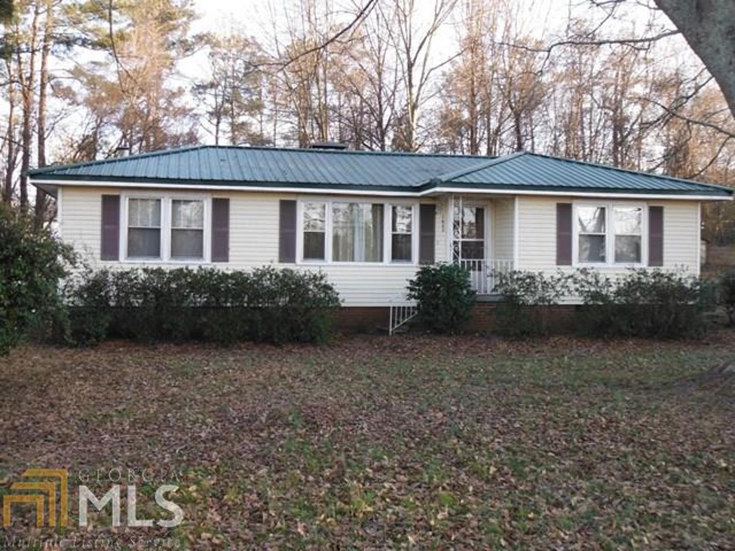 New Roof. Large family room. Separate dining room 2 Bedrooms 1 Bath describe this cute home! Hardwood floors. Fireplace with gas logs in family room. Private backyard. Zoned C2 is a plus. Great location for florist, medical office, legal office, hair salon or gift shop. Endless opportunities! Tenant occupied