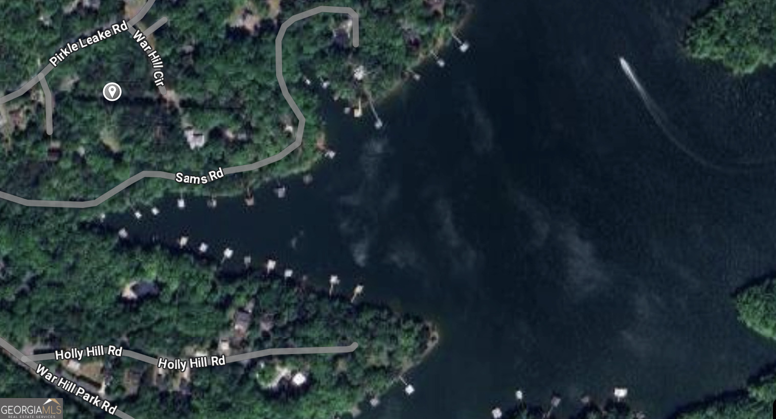 BUILD YOUR DREAM HOME ACROSS FROM LAKE LANIER. THIS BEAUTIFUL ACRE LOT IS CLOSE TO BOAT RAMP AND A MINUTE AWAY FROM WAR HILL PARK. ALSO LOCATED JUST MINUTES AWAY FROM ATHENS BOAT CLUB & THE DAWSONVILLE OUTLET MALL. NO HOA/COVENANTS. Survey, Soil Test completed. Should be ready for permit submission in the next 30 days with our plans Bring your builder!!