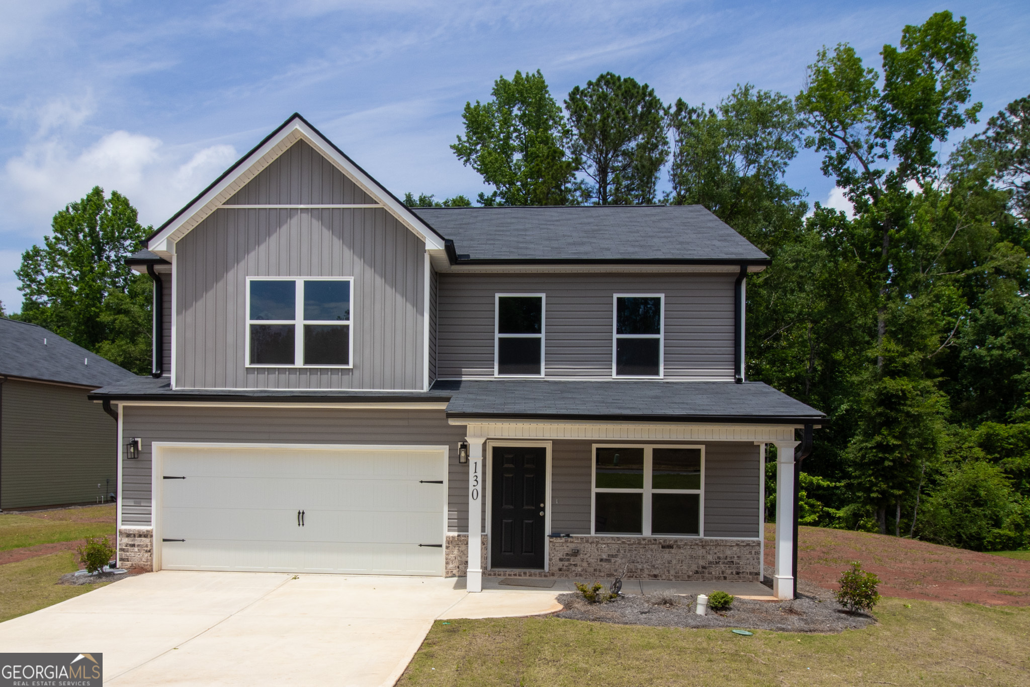 Introducing the "MAPLE" plan to Davis Lake! This traditional two-story home offers 4 bedrooms including a guest bedroom and full bathroom on the main level. The main level offers a spacious family room, formal dining room, and kitchen with granite counters and pantry. Upstairs is the large primary bedroom with vaulted ceiling, walk-in closet, garden tub, and separate shower. Standard features include low maintenance vinyl & brick exterior, granite countertops, wood cabinets, LVP and carpet flooring, along with brushed nickel finishes. Located in established neighborhood with no HOA!