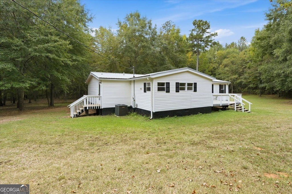 Photo of 308 Blounts Chapel Road, Haddock, GA 31033 (MLS # 10868444)