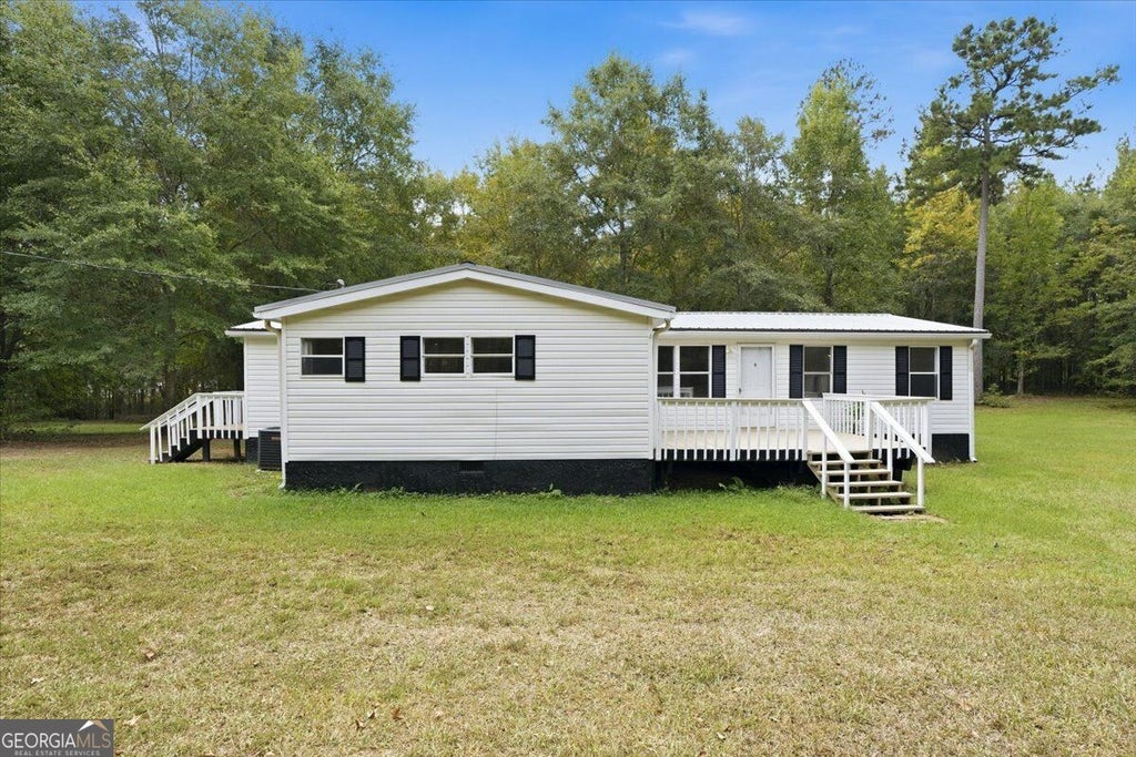 Photo of 308 Blounts Chapel Road, Haddock, GA 31033 (MLS # 10868444)