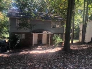 Duplex Home with 2 units side by side, Common driveway leads to wide parking pad on side of the home. Each unit has a private, covered front door. Each unit has 2 bedrooms and 2.5 baths. Home is on a private, wooded lot in an established neighborhood. Convenient to major highways and roads, shopping, and restaurants.