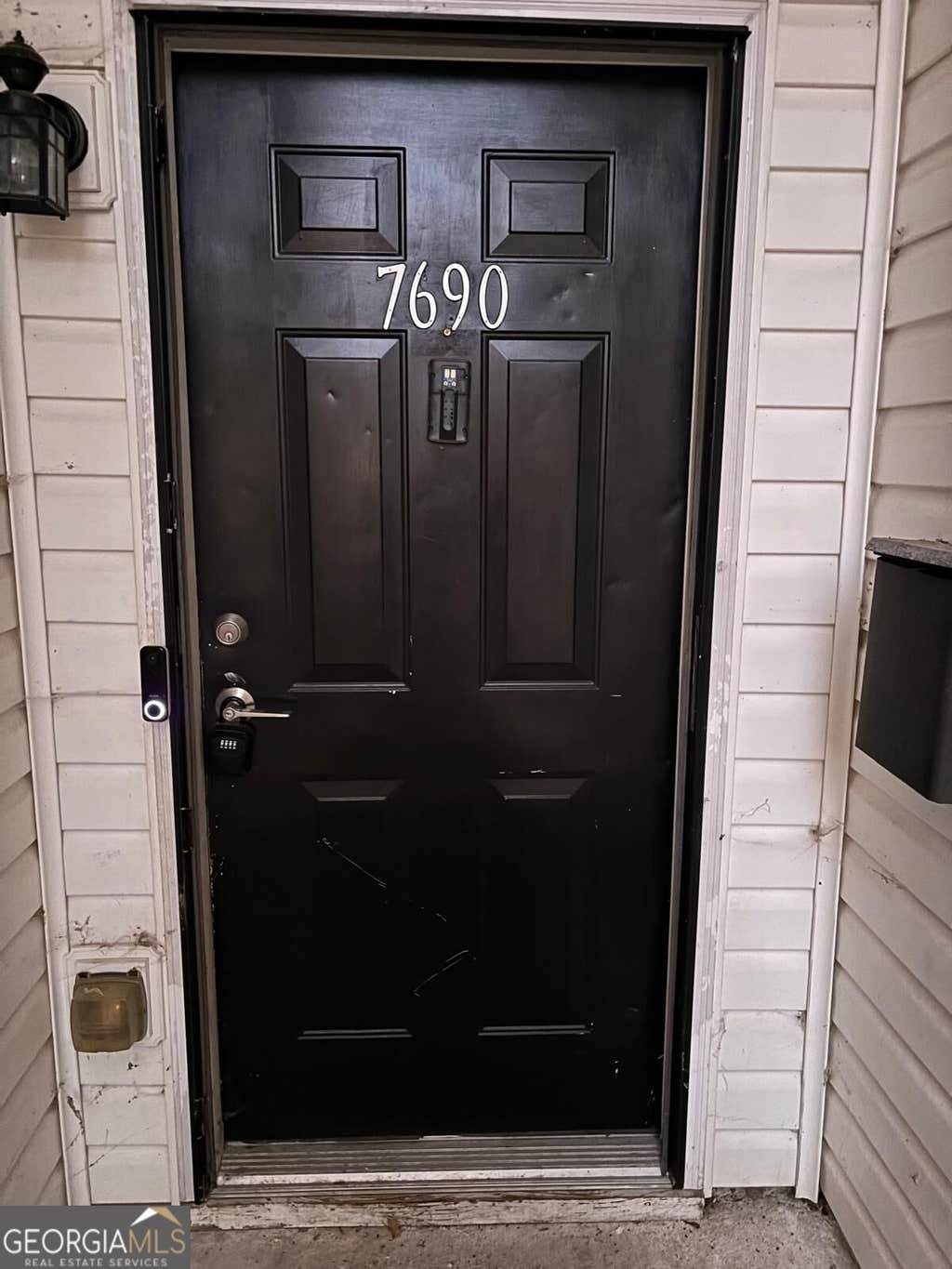 Photo of 7690 Creekside Lane, Riverdale, GA 30296 (MLS # 10826916)