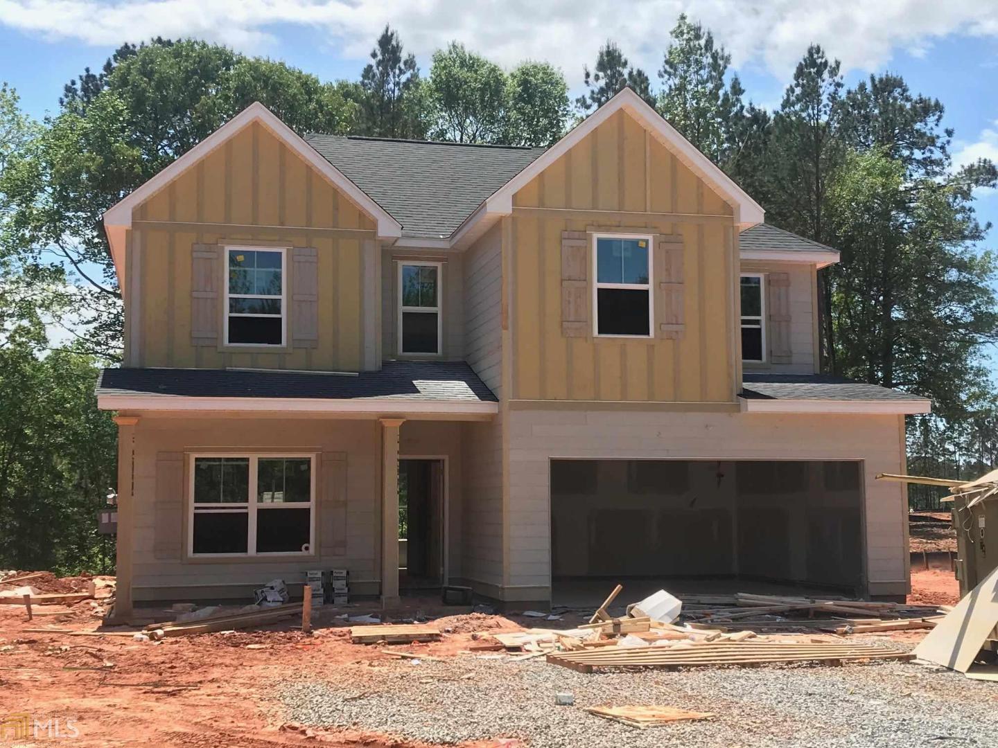 WOW...THIS IS A LOT OF HOUSE FOR THE MONEY & OH, SO CUTE! Craftsman style stunner w/so many designer extras that you are going to be AMAZED!HUGE Chef's Kitchen w/central Granite Island,Designer Gray Color Palette,Tiled Backsplash,LVP flooring in kitchen, foyer, dining, powder room, great room & breakfast area for maximum flow and to be on point with today's trend and it's total LOW MAINTENANCE!Stainless appliances,angled coffered ceiling in the Dining Room. Master Suite with sitting area,Tiled Bath w/ granite counter tops, designer tiled shower and 3 MORE BEDROOMS! Covered back patio, concrete siding, 2/10 Warranty, Low-E high efficient windows and our Homeowner Orientation are just a few more reason to LOVE a Trademark Home!