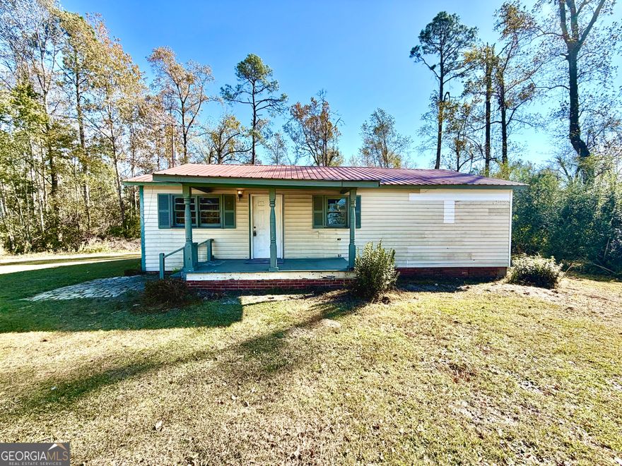 Looking for a home with potential and peaceful surroundings? Check out this 3-bedroom, 1-bath fixer-upper sitting on just under half an acre, perfectly nestled between woodlands and farmland for that quiet country lifestyle you've been dreaming of.  Enjoy the best of both worlds - peaceful country living while being only minutes from town for your daily conveniences. With a little TLC, this property could easily become your dream home or next investment project.  Located in the friendly small town of Twin City, you'll love being part of a community known for its charm and top-rated ECI school system.  Don't miss this opportunity to put your personal touch on a home with so much potential and a truly beautiful setting!