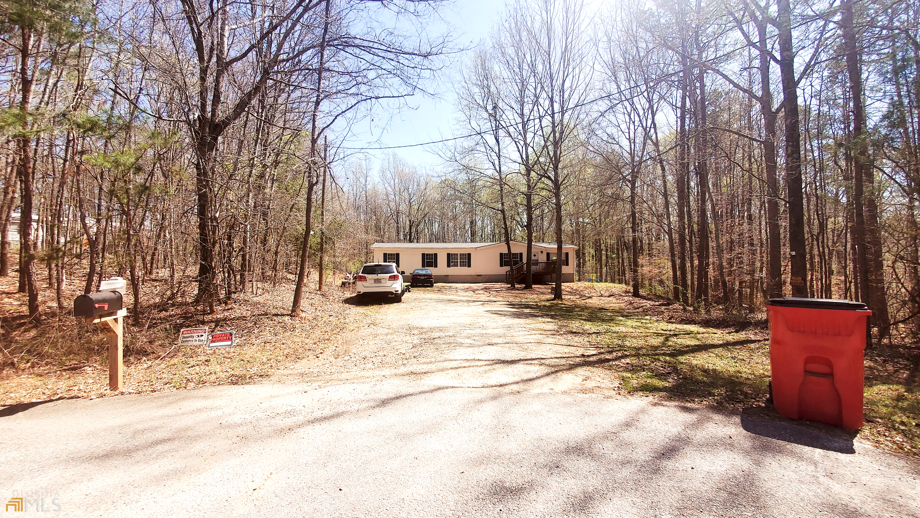 Wonderful home on 2+ acres in Jackson County. This home is move-in-ready and just needs some cosmetic work to make it your dream home! Large and spacious rooms. Master bedroom has a large master bath with double vanity, soaking tub, spacious shower and walk in closet. Big open kitchen with dining area. Washer, dryer, stove, dishwasher and fridge will remain with the home. Home has a front porch and a covered back porch. Two new storage sheds in the backyard, along with two old storage sheds that need some TLC. This 2+ acres property is wooded and provides tons of privacy and is less than 10 minutes from the heart of Jefferson. Work from home with ease with the Internet service provider (ISP): Comcast Xfinity Average speed: 200+ Mbps. Great access to 129 to puts you 25 minutes from Athens and 15 minutes from 85. Situated in a cul-de-sac in a quiet neighborhood with very little traffic. This unrestricted property is a homesteader's dream, hunt in your own backyard or start a little farm! This won't last long, schedule your showing today! Home will qualify for FHA. Seller is licensed real estate agent