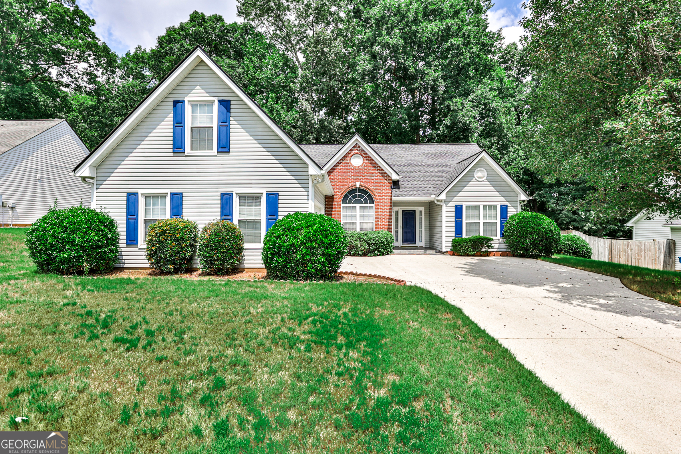 Turn key opportunity in an established Dacula neighborhood. This traditional ranch has a great layout to maximize the square footage with an open layout. Upon entering the freshly painted walls, high ceilings and natural light welcome you in. The living area is anchored by a gas fireplace and has a view to the kitchen and dining area. The kitchen features solid stone countertops, 2 separate pantries and a perfect breakfast nook. The large primary bedroom is separated from the rest of the home to provide a private retreat with high ceilings, ensuite bath, and walk in closet. Bonus room over the garage is perfect for a playroom, office, home gym, or studio. Back patio is a quiet area to relax or grill out with family and friends. Community offers swim, tennis, playground and sidewalks throughout with low HOA. Conveniently located near I-85, the Mall of Georgia, and Highway 316, this home provides easy access to shopping and commuting.