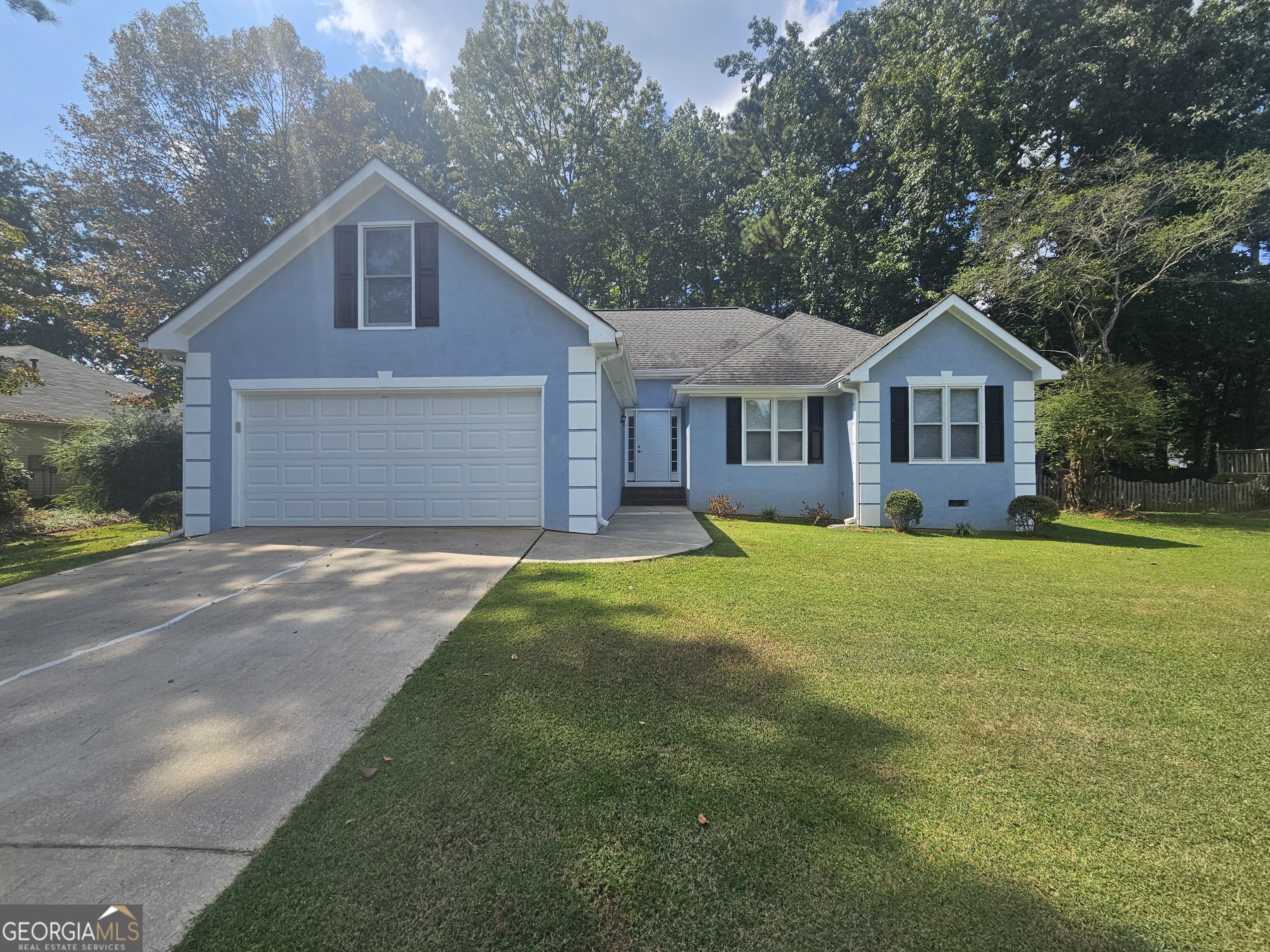 Spacious/Updated Woodstream Subdivision 4 Beds & 2 Baths Home w/Screened Back Porch! 4th Bed is Above Garage! Kitchen w/Granite Countertop! New Stainless Steel Appliances! Enjoy Floor Plan Perfect for Entertaining & Comfortable Everyday Living! New Laminate Flooring! Owners Suite w/Walk-in Closet, Separate Tub & Shower, Dual Vanities, Trey Ceiling! Formal Dining Room & Breakfast Area/Bar! Living Room w/High Ceiling! New Light Fixtures & Hardware Package! Large Deck! Northgate High School! Quick Access to Newnan or Peachtree City's Shopping & Dining! 2 Car Garage w/Automatic Openers! Amenities Include Playground, Pool and Tennis Courts! Welcome Home in 2025!