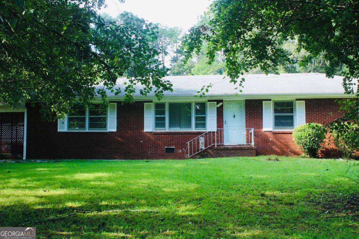 Endless possibilities for this beautiful 4.3 acres of land property in the heart of South Fulton. Conveniently located near Amazon distribution center this property offers investment potential, tear down and rebuild or even enough space for an expansion on the existing structure, the choice is yours. The home on the property needs some TLC to make it your own.