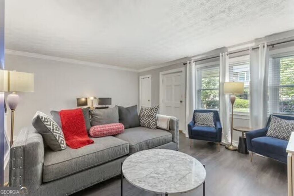 Photo of 311 Lakemoore Drive NE #APT C, Atlanta, GA 30342 (MLS # 10774814)