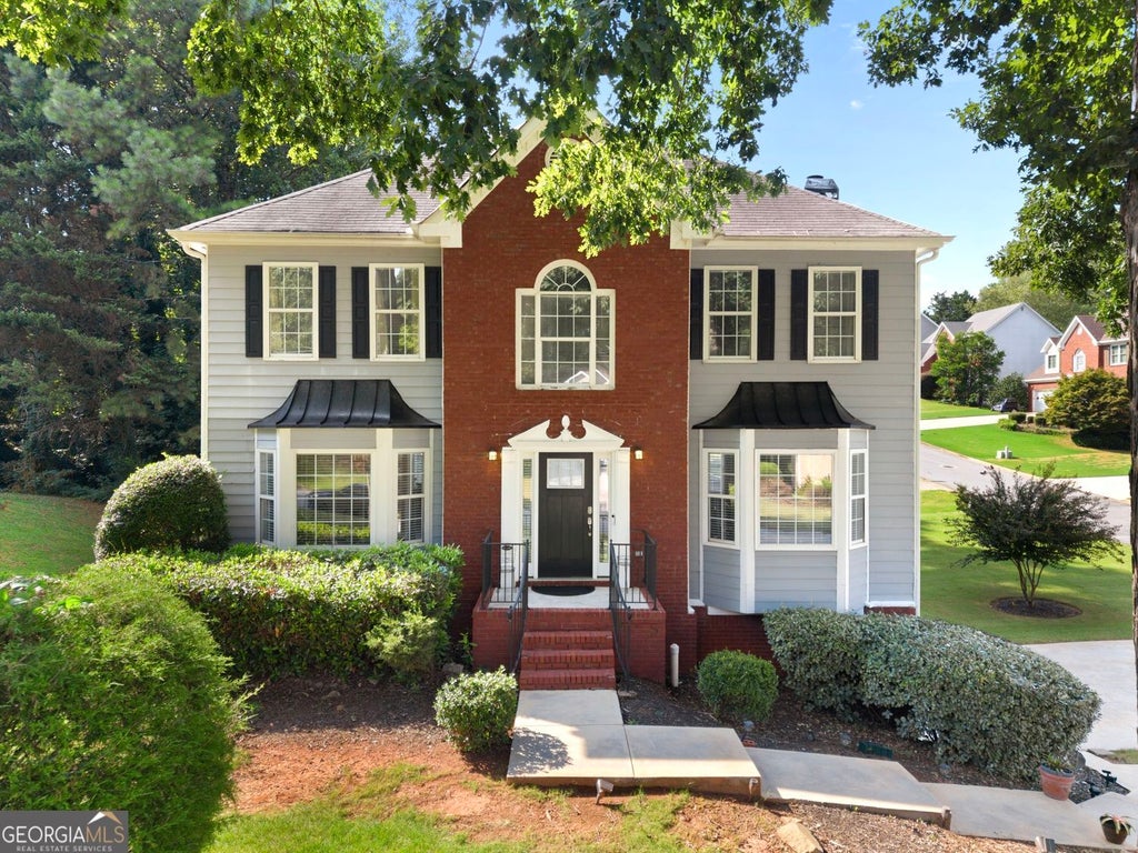 Photo of 725 Somerset Vale Drive, Lawrenceville, GA 30044 (MLS # 10839771)