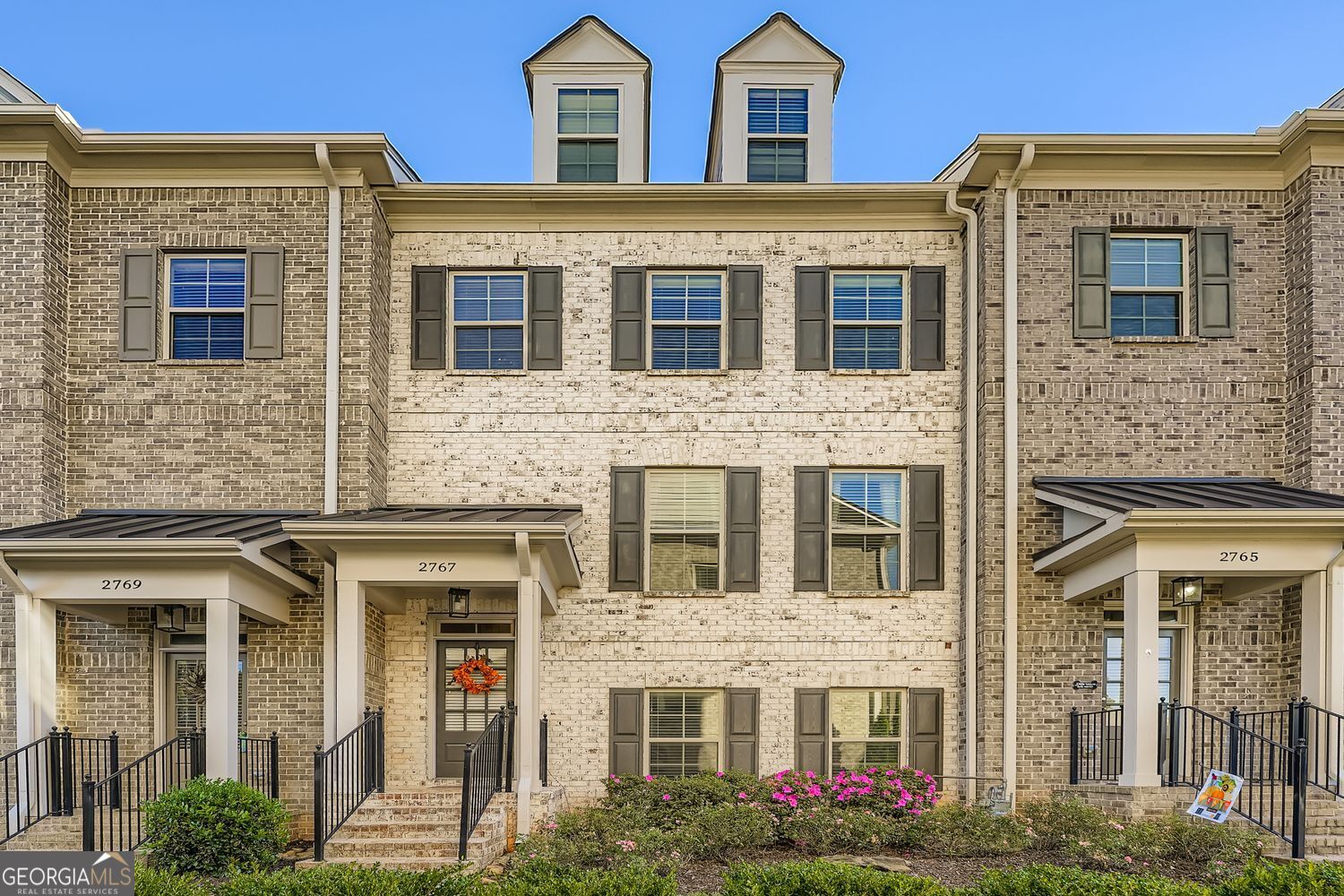 The reason you have not found the right home is because you have not seen this one yet. This home is in the heart of Kennesaw and a stone's throw from entertainment, dining, and shopping. Whether it is enjoying the fall colors or watching Kennesaw's famous annual Firework's Show, you are certain to enjoy the many opportunities available to you. This home boasts all hardwood on the main floor, an open kitchen with chef's island & quartz tops, stainless steel appliances, tile backsplash, pantry, and view to dining area. The owner's suite features a trey ceiling and his and her closets. The owner's bath features dual vanities and a tiled surround shower with bench seat. There are also two secondary bedrooms upstairs with a separate full bath that features a tile surround tub with tile floors. The lower level offers a 4th bedroom and 3rd full bath. But don't take our word for it; call us and see this magnificent home today!