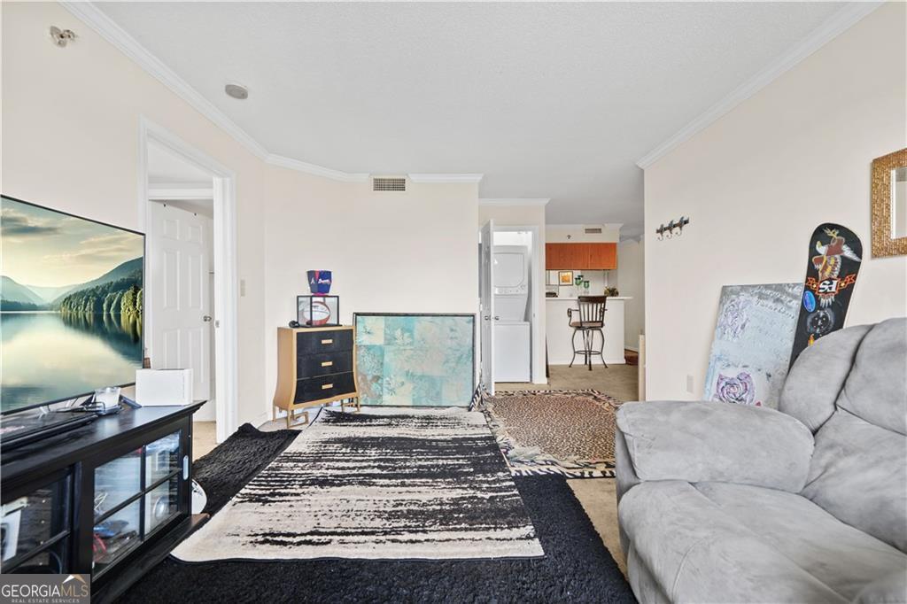 This 1 bedroom, 1 bathroom condo puts you right in the heart of Sandy Springs. Located minutes from Perimeter Mall, GA 400, I-285, and MARTA. Step inside to find an open living and dining space filled with natural light, a spacious bedroom with a walk-in closet, and your own private balcony. It's perfect for sipping your morning coffee or winding down at night. This unit comes with 24-hour concierge and top-tier security, a sparkling pool with cabanas and grilling areas, a modern fitness center with Peloton bikes, dog park, playground, on-site market, and dry-cleaning services. Plus, enjoy direct access to Hammond Park for tennis, pickleball, and more outdoor fun. Whether you're a first-time buyer, busy professional, or investor, this condo offers lock-and-leave convenience with a vibrant community feel. Walk to shopping, dining, and entertainment, or catch a quick MARTA ride downtown; city living has never been this easy.