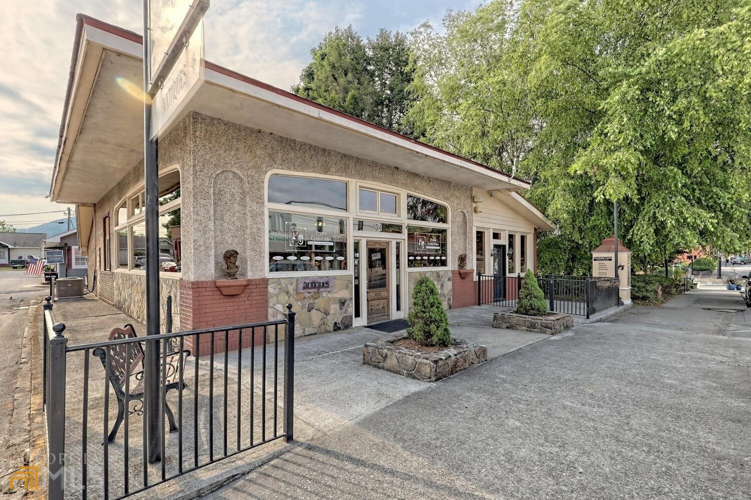 Here is your opportunity to own the best retail location in downtown Clayton! An A++ location combined with a gorgeous historic building is your key to a high traffic count to ensure a successful business. This masonry structure features two spacious retail showroom areas, a commercial kitchen, an ADA bathroom, and an office with a private bath. The patio areas between the existing building and the city sidewalk offer room for patio dining. There is a parking area at the back of the store. There are options to enlarge the structure by adding an addition on the back, the front, or up! There is so much Clayton history wrapped up in this building! Ask to see the photos of the original owner's son and his roommate, Babe Ruth posing out front. Oh, if those walls could talk! Don't miss this chance to buy this premiere downtown Clayton location!