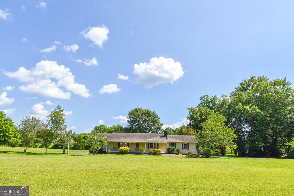 Photo of 12394 Ga Highway 109, Meansville, GA 30256 (MLS # 10795579)
