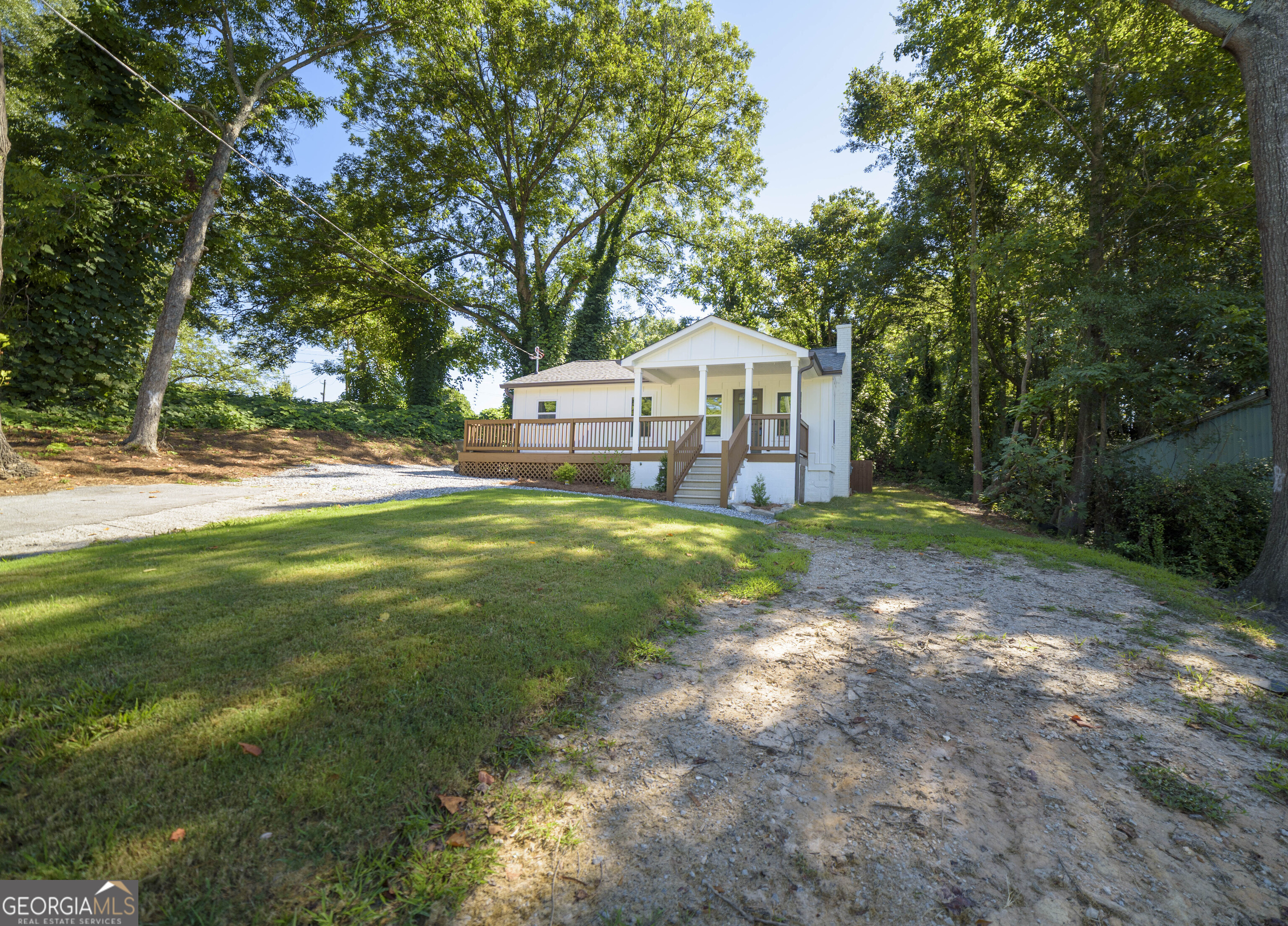 Located right in the heart of downtown Toccoa, this charming ranch style home is within walking distance to local stores and just minutes from all your favorite restaurants, offering the perfect blend of convenience and community. Minuetes away from Toccoa Lake & Toccoa Falls College. Nestled in a quiet and welcoming neighborhood, this completely renovated two bedroom, one bath residence is ideal for a couple or small family seeking comfort and modern living. Every detail has been thoughtfully updated inside and out, featuring a brand-new roof, cement siding, windows, insulation, and Sheetrock, along with updated plumbing and electrical systems throughout. The interior boasts spacious rooms with fresh paint, new flooring, and recessed lighting that adds a warm and contemporary touch. The fully renovated kitchen showcases stainless steel appliances, new cabinets, sleek countertops, and ample storage space. The bathroom has been tastefully redesigned with a tiled shower, quartz countertop vanity, and new light fixtures for a fresh, upscale feel. Additional upgrades include a new A/C unit, water heater, and a huge front porch perfect for relaxing outdoors. The property offers a big front yard with two entry points and a flat backyard, providing plenty of space for outdoor enjoyment. Don't wait to view this amazing property. Schedule your showing today!