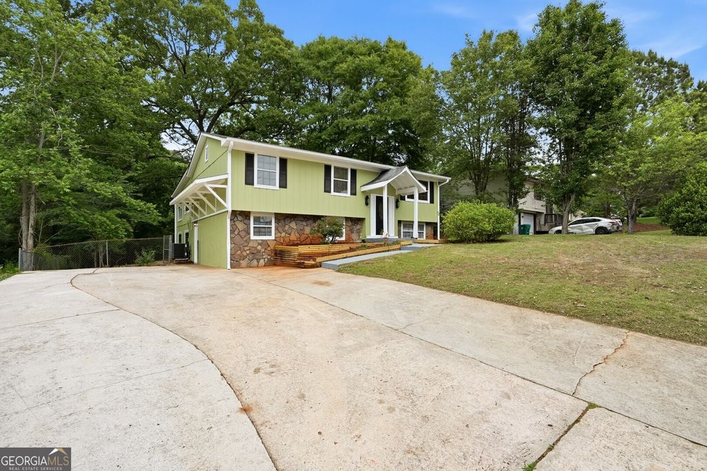 Photo of 4780 Big Valley Road, Stone Mountain, GA 30083 (MLS # 10766530)
