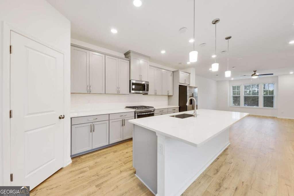 Photo of 1268 Berwyn Way #1268, Suwanee, GA 30024 (MLS # 10829736)