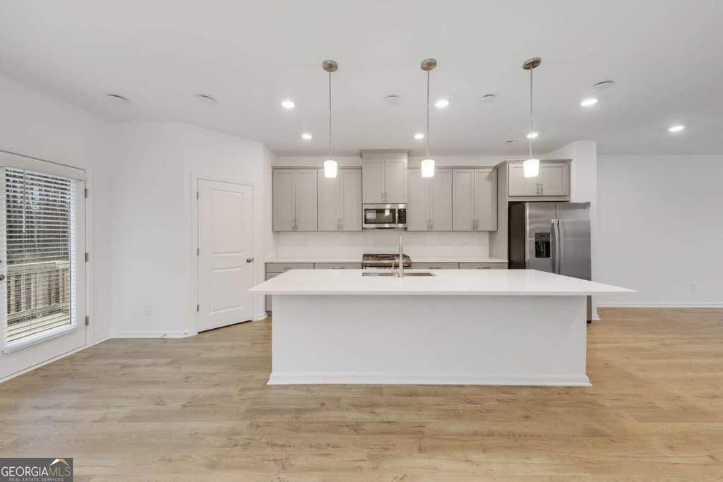 Photo of 1268 Berwyn Way #1268, Suwanee, GA 30024 (MLS # 10829736)