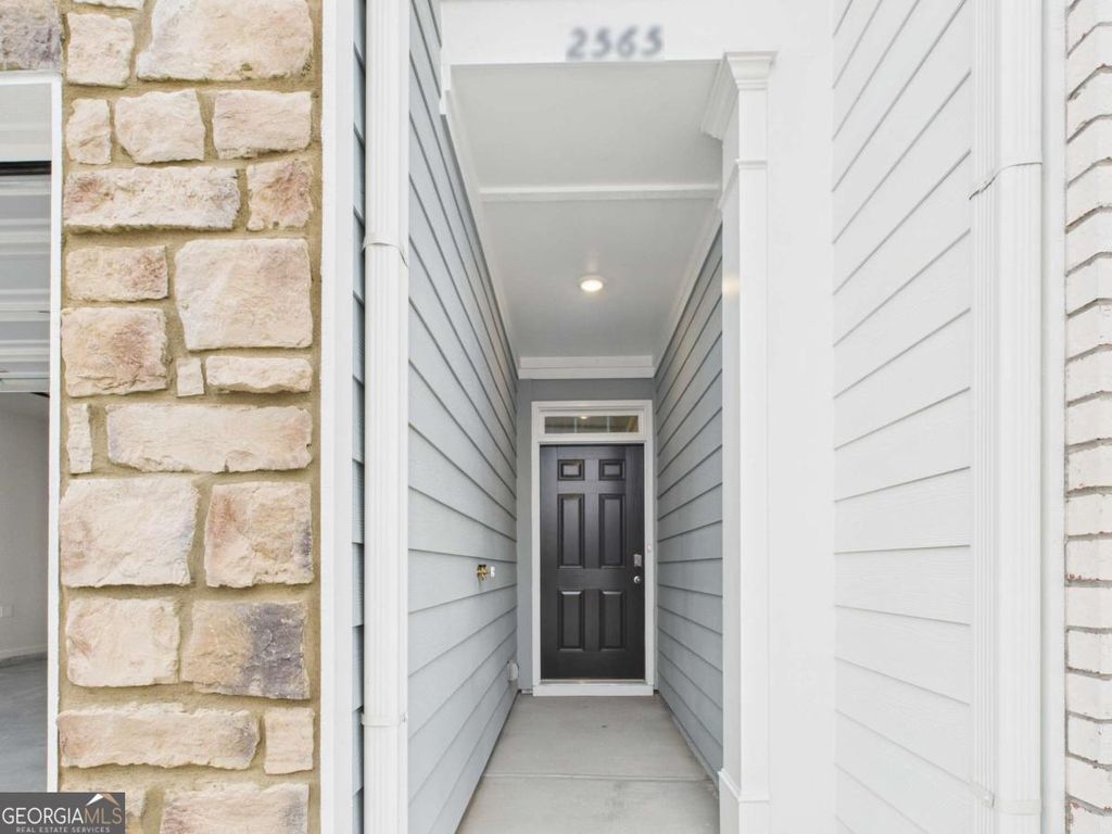 Photo of 2565 Poppy Court #100, Buford, GA 30519 (MLS # 10661578)