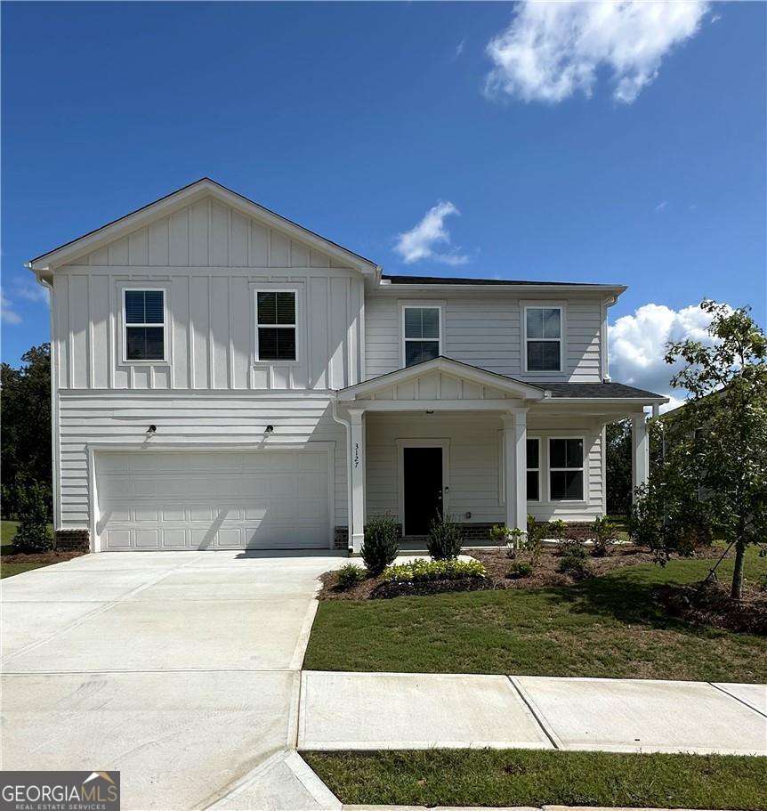 Discover this beautifully designed two-story home in the new Avery Ridge community! The open-concept layout features a stylish kitchen with gray cabinetry and clear sight lines to the gathering room-perfect for both everyday living and entertaining. Step outside to a relaxing back patio overlooking a scenic backyard, offering additional space to enjoy with family and friends. The owner's suite boasts a walk-in shower and dual vanity, while the main level includes a versatile flex room. Upstairs, a cozy loft provides even more living space. Avery Ridge feature amenities, include a community pool and cabana. Conveniently located just minutes from I-985 and less than 5 miles from Downtown Gainesville, this home offers both comfort and convenience.