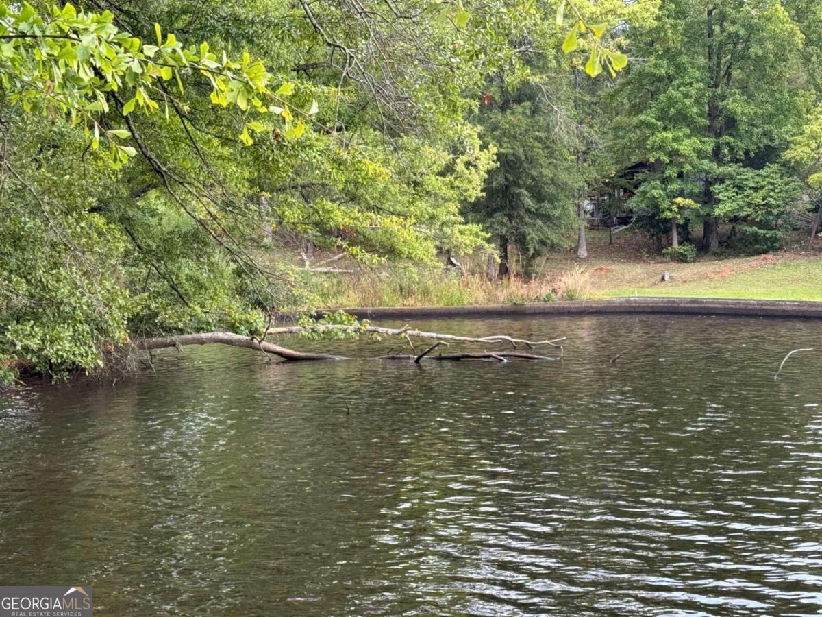 Options abound with these three lots. Purchase price listed is for all three as one lot. Possibility you can build on one and keep others. Or develop in to your own Cove On Lake Sinclair!