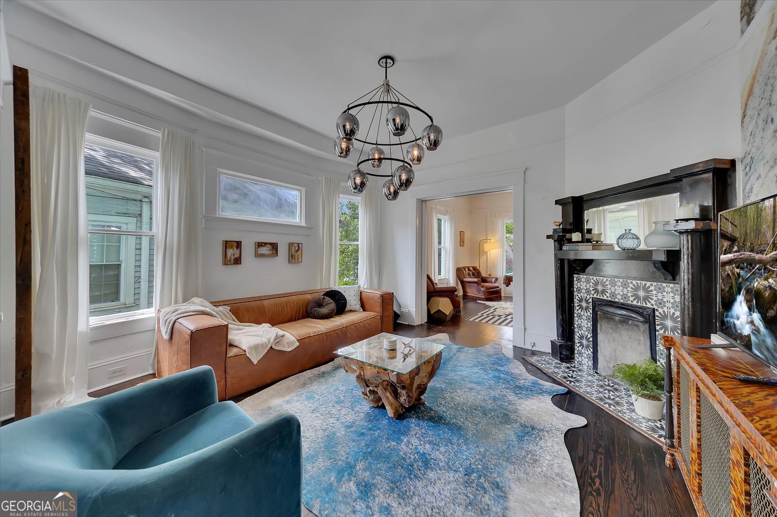 This beautifully updated FULLY FURNISHED two-bedroom, two-bathroom home offers comfort, style, and convenience-all on one level in the heart of Atlanta's Inman Park. Each bedroom, the living room, and the game room feature their own fireplace, while the master suite includes an extra sitting room/office space for work or relaxation. The home boasts a fully equipped kitchen, a separate dining room, and a dedicated game room with a pool table. Step outside to the large covered porch, perfect for entertaining or enjoying quiet evenings. Bedrooms feature cozy mattresses, 100% cotton linens, and fluffy down pillows, while modern amenities like in-unit laundry, fast WiFi, smart TVs, Ring cameras, and keyless entry ensure convenience and security. FLEXIBLE LEASE TERMS are available, with pricing based on a 12-month lease. Utilities included options are available upon request, and short-term stays are welcome (rates and charges may vary). Located steps from the BeltLine, Krog Street Market, parks, and local restaurants, this home combines modern comforts with one of Atlanta's most vibrant neighborhoods.
