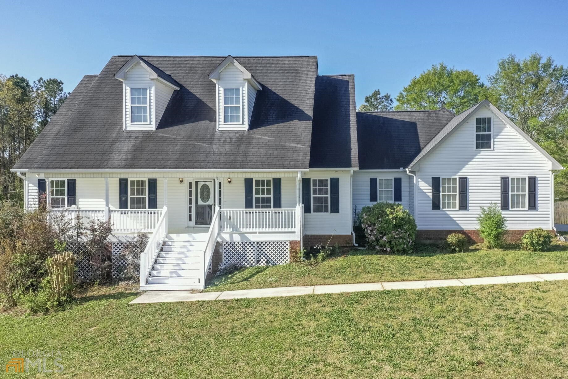 You won't find this square footage at this price! Located within 5 miles of the historic Covington Square, new Town Center development and ever growing Three Ring Studios, enjoy this quiet property with everything still at your fingertips. New flooring throughout the main level, new HVAC and recently painted, this turn key home has something for everyone. The open floor plan boasts a formal dining room and spacious kitchen over looking the large living room with vaulted ceilings. Find three bedrooms, two bathrooms on the main level with a large bonus room and ample storage. Need more? Step down to the walk out basement for an additional bedroom and bath, living area and office space. Above ground pool and hot tub to stay and seal the deal on this perfect outdoor oasis. HOME IS OCCUPIED- Please use ShowingTime MUST have appointment. Agents, please review private remarks.