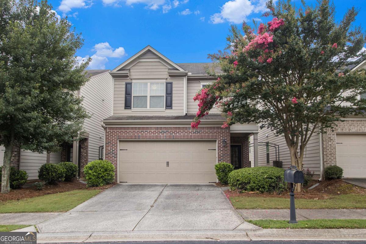 This is a must-see! Located in the highly sought-after South Forsyth area, this beautifully maintained 3-bedroom, 2.5-bathroom home is perfectly positioned for convenience and lifestyle. Within just 4 miles, you'll find top-rated schools, premier shopping, popular restaurants, and easy access to major highways-everything you need right at your doorstep. Inside, you'll find an open-concept layout, spacious primary suite, with hardwood flooring downstairs and carpet in the bedrooms upstairs. The patio is great for entertaining, and the quiet cul-de-sac adds even more to love. Don't miss your chance to own in one of Forsyth's most desirable neighborhoods! No rental restrictions!