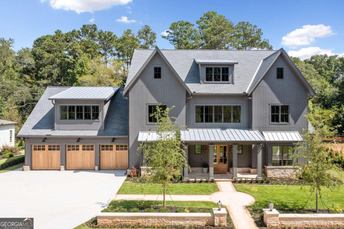 Complete and move-in ready! Southern Living Magazine's Custom Builder of the year, Chathambilt Homes is proud to announce its newest gated luxury community, Baxley. Located a mile from AlpharettaCOs City Center, Baxley is an exclusive enclave of 6 custom homes featuring unparalleled luxury appointments. As you approach the home on the hand cut limestone walkway, you are greeted by the warmth and ambiance of the Bevolo gas lanterns. The exterior of the home is wrapped in Artisan siding by James Hardie Vertical Siding featuring Pella Windows and Doors with stained tongue and groove porch ceilings. Once you enter through the mahogany doors, you the step onto the herringbone white oak flooring in the foyer as you enjoy the views of the open floor plan leading your eyes to the floor to ceiling glass wall. The home also includes custom inset cabinets and built-ins capped with quartz countertops and backsplash throughout, Sub Zero/Wolf appliances. The expansive family foyer that one enters off the garage has well thought out custom built cabinetry with ample storage to organize a busy lifestyle with flare and design. Main living room opens seamlessly to the vaulted covered porch. Primary suite on main featuring louvered sleeping porch. Kohler plumbing fixtures, pad for a swimming pool, Schluter master bath heated floor underlayment and heated shower seat, curbless double French-door shower, double water closet and vanities in the master bath, marble tile throughout, elevator ready closet, tulip poplar ceiling accents, soft-close interior slider doors, premium closet systems, dog wash, pet food and water station, built-in reading nook, and a 3 car garage with Clopay cedar overlayed cedar garage doors and composite garage floor finish are some of the amazing custom details featured in this home. The second floor features three ensuite bedrooms and a loft area and large bonus room. The home was constructed with energy efficient systems including Rinnai tankless water heaters, radiant barrier roof sheathing, cellulose insulation, Zip wallboard system, and 90%+ efficiency furnaces