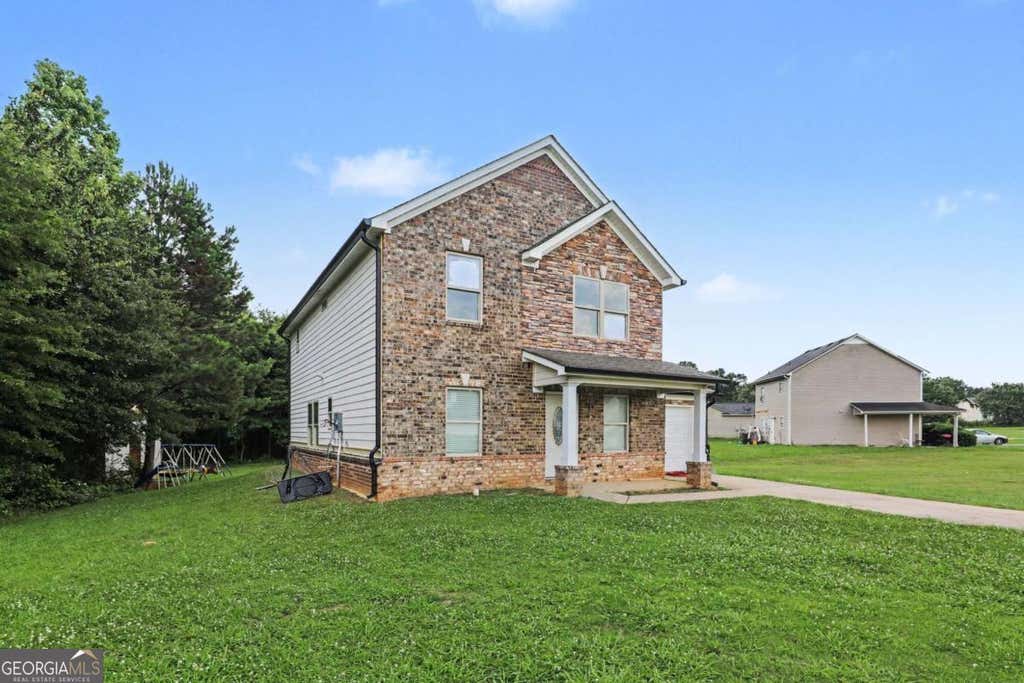 Photo of 226 Woodwind Way, Jonesboro, GA 30238 (MLS # 10786186)