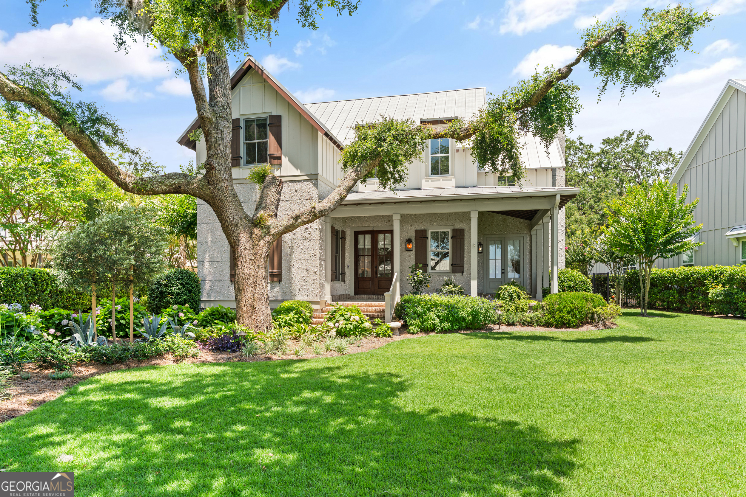 Meticulously maintained home with 4 bedrooms and 4 bathrooms with thoughtful design and upscale finishes throughout. This home offers a dedicated yoga room and a newly added cozy sitting area off of the kitchen. Enjoy a serene coastal living with beautifully landscaped yard with stunning pocket marsh views just across the street. The open, light-filled layout blends comfort, and curb appeal making it ideal for everyday living or hosting guests. The chef's kitchen is masterfully crafted with both beauty and function in mind, featuring quartz countertops, a gas cooktop, and a farmhouse sink - sure to impress even the most discerning cook. Step outside to your private backyard oasis, complete with sparkling pool and newly added screen porch perfect for that extra cup of coffee or afternoon breeze. Located in a small, gated neighborhood centrally located on the island, this home offers the convenience of easy access to all the best the island has to offer. You don't want to miss this rare island gem.