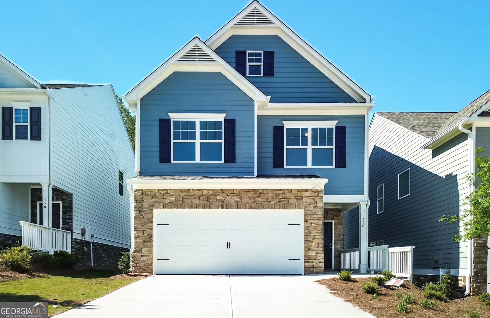 Beautifully crafted Model Home for sale at Castleberry Pointe community. The Cambridge plan is a 3 Bedroom, 2.5 Bath with a Loft/Flex Room. This inviting home features an Open Concept with an inviting Foyer, 1/2 Bath on main level. Family Room with Gas F/P open to the D/R which is overlooked by the Kitchen. The Kitchen features 36" White Cabinets, Island, Breakfast Bar, Quartz, LED Lighting, SS appliances including side by side Refrigerator, Microwave, Gas Stove, and Dishwasher. Vinyl Plank floors throughout the main level. Open Rail Stairs leading upstairs with Laundry Room, Secondary Bedrooms and Hall Bath with raised height sink and Cultured Marble. The versatile Loft/Flex space open to the Primary Suite featuring Trey Ceiling and an abundance of natural light. Master Bath has hugh walk-in-closet, private water closet, 42" Tiled Shower, Garden Tub with 40X40 Window, Raised Height double sinks with Cultured Marble. The exterior has a Rear Patio for outdoor living and a front entry 2 Car Garage. The location of this community is one of the best features. Close to SR 400, Outlet Mall and an abundance of Resturants. The appliances will stay all furniture will be removed. This home will be ready to close December 2025. Front photo is same plan different home.