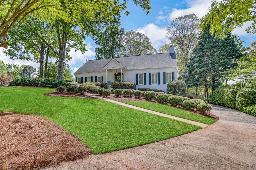 This 4-bedroom/3.5-bathroom, Master on the Main Home in Duluth will pull you in and captivate you from the moment you see it! Idyllically situated on a sizeable 0.43-acre lot in a quiet and sought-after area, this 5022 sq ft property mesmerizes with a newly painted white, 3 sided brick exterior, meticulously planned landscaping that truly emanates the most stunning curb appeal in the area. Step inside the stunning interior to find soaring foyer ceilings, attractive wood flooring, a neutral color palette, tons of shimmering natural light, an openly flowing floorplan, and an enormous family room with a cozy fireplace. Marvelously renovated for both superb form and supreme function, the show stopping, open concept gourmet kitchen features premium stainless-steel appliances, quartz countertops, custom cabinetry, a hidden main refrigerator, a gas range/oven with a matching hood vent, a huge center island with a hidden refrigerator, sleek hardware, recessed lighting, a pantry cabinet with pull-out shelving, vaulted ceilings, a dry bar area with a beverage refrigerator, the central focal point of the room; the island, also doubles as a spacious dining area. Entertain guests in the huge fully fenced backyard, which has a beautiful screened in porch with lovely backyard views, that also offers additional storage under it, a spacious deck, tons of greenspace, and ample room for grilling and chilling. Host indoor gatherings in the partially finished basement with a game room and a potential extra bedroom/flex space. Serving as a chic daily retreat, the main-level primary bedroom features an enviable custom closet and a remodeled en suite with a soaking tub, a separate shower with a rain head shower feature and body sprayer, a built-in makeup vanity, fashionable light fixtures, and dual vanities. Two additional bedrooms and two bathrooms are situated on the upper-level, in addition to a loft overlooking the one-of-a-kind kitchen. Other features: attached 2-car side entry and drive under garage, laundry area, extra basement storage, separate office, only 29-miles from Downtown Atlanta, close to shopping, restaurants, Sprouts Farmers Market, Lidl, Kroger, I-85, medical facilities, Starbucks, multiple parks, and schools, and so much more!