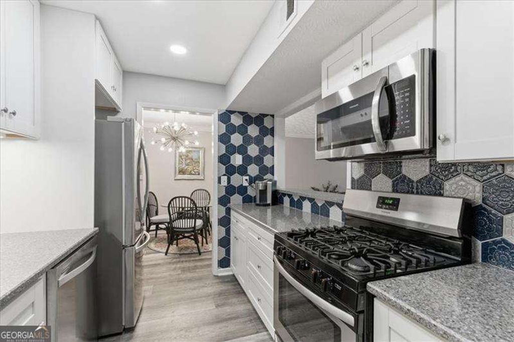 Photo of 501 Dunbar Drive, Atlanta, GA 30338 (MLS # 10688789)