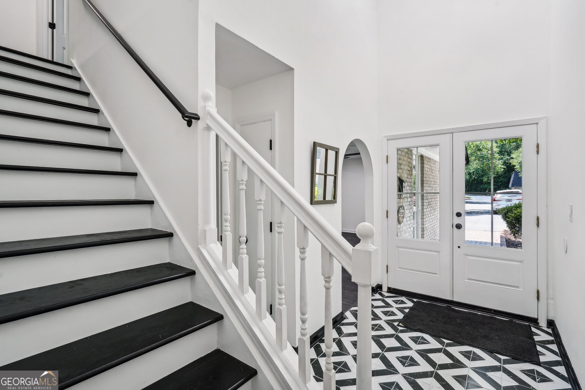Introducing 5490 Chemin De Vie One of Sandy Springs finest. Step into the idealic charm of this 3 bedroom, 2.5 bath condo with over 2000 sq ft of living area. Virtually Staged to Show the home's potential This elegant home has been fully revitalized and renovated. Located in The Cloisters Subdivision a well-rooted condo community ideally situated midway between Buckhead and Sandy Springs with no rental restrictions. This exquisite home has been meticulously rejuvenated from top to bottom sparing no detail. Enjoy the open-concept design featuring modern upgrades with high-end fixtures and gleaming slate flooring throughout. The kitchen is a chef's dream fully equipped with ample granite counter-tops stylist cabinetry and a stainless steel appliance pkg with a cut-out view to the spacious dining room. The generously sized master bath features a separate free standing MTI tub and walk-in glass shower perfect for a spa-like experience. Additional features include a converted garage providing a spacious additional living area for a bonus room home office or playroom. A private fenced patio. The spacious back yard garden includes a privacy fence. Just right for family barbecues & outdoor entertainment. Chastain Park, Kroger, Prado, Lifetime, Starbucks, more restaurants and 285 are all within 2 miles. 10 minutes to Perimeter and Buckhead! Rand & Associates Preferred Closing attorney