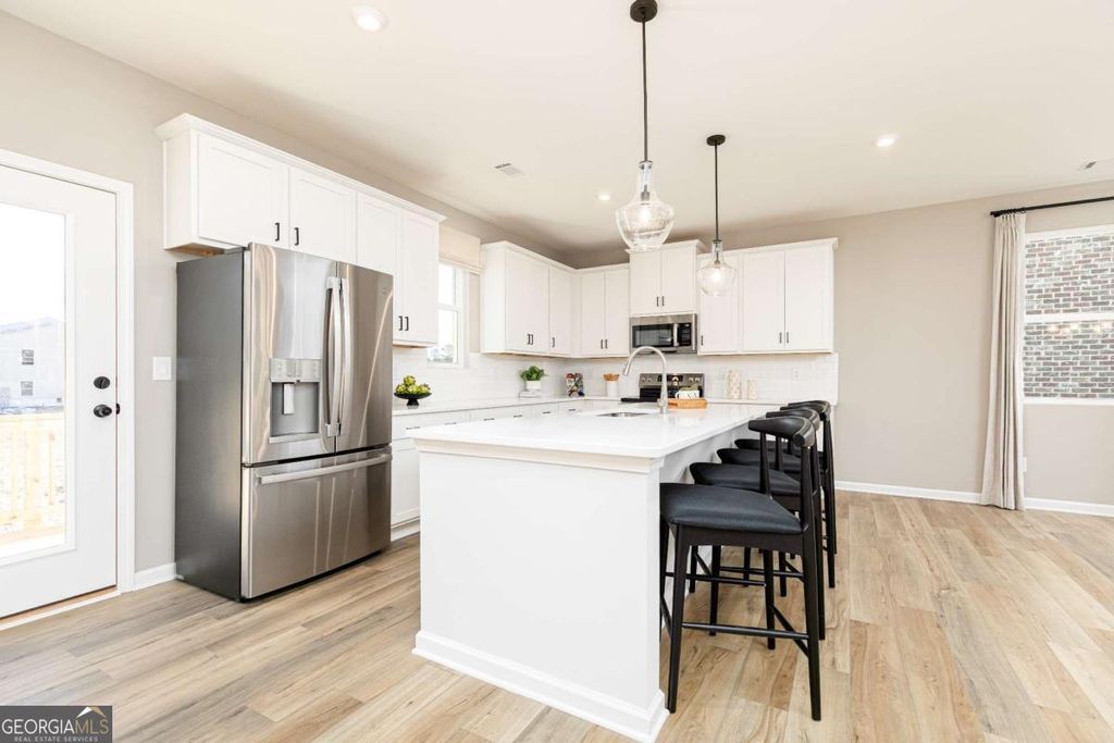 Photo of 3505 Tristens Cove Walk, Loganville, GA 30052 (MLS # 10754082)