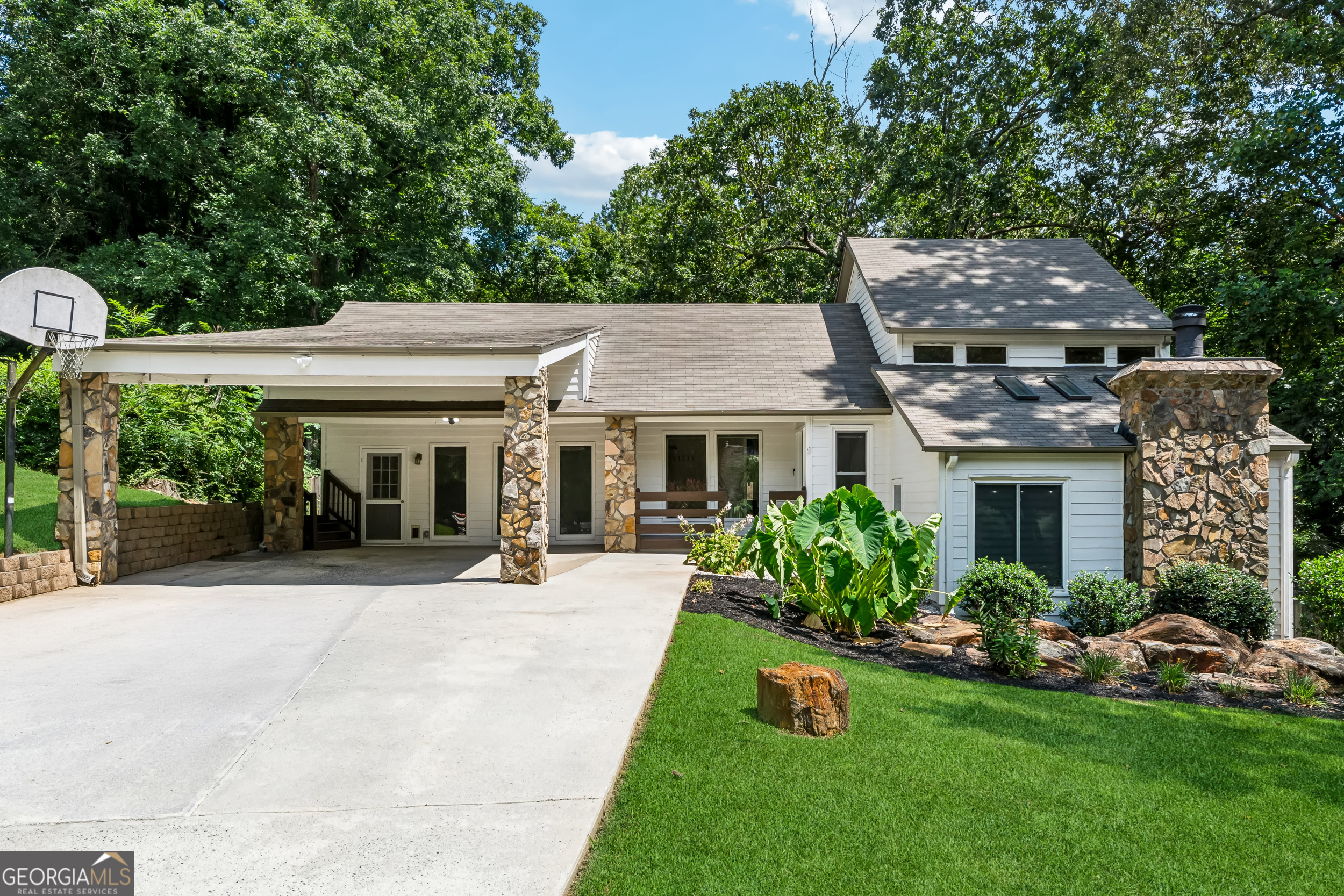 This stunning, one-of-a-kind split-level home offers a unique layout, beautiful finishes, and an impressive list of major recent upgrades. Step inside to a bright, open interior featuring a spacious kitchen with multiple views of the landscaped, fenced backyard, a serene screened-in deck, and a large bonus room overlooking the heated indoor pool- a rare luxury you can enjoy year-round. The primary suite includes a recently renovated bathroom, while the upstairs bath was completely remodeled in 2021. In 2025, the home received a brand-new pool enclosure, fresh exterior paint, fascia board replacement, and extensive pressure washing to maintain its pristine curb appeal. Major system updates include a new furnace (2022), pool pump (2023), pool liner and sand filter (2024), and a new blower motor on the AC (2025). The property also features a replaced master bedroom window and a new jack post in the crawlspace for added structural support. With so many high-value improvements already completed, this home is truly move-in ready. Perfectly situated in a wonderful Marietta neighborhood, this home blends style, comfort, and smart upgrades into one exceptional property.