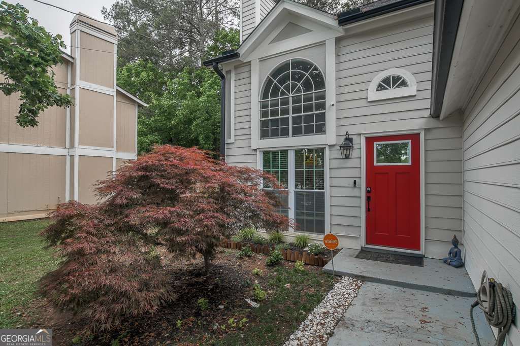 Photo of 2005 Downs Place, Lithonia, GA 30058 (MLS # 10758094)