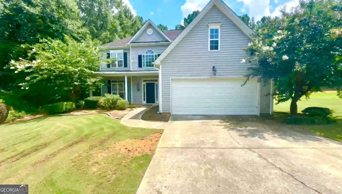 Spacious 4BR/2.5BA Home with Great Layout & Endless Potential! This 4-bedroom, 2.5-bathroom home offers a fantastic opportunity to create your dream space with just a bit of TLC. Featuring a dramatic two-story foyer, this home welcomes you with abundant natural light and a thoughtful floor plan perfect for both entertaining and everyday living. The main level includes a formal dining room, a spacious formal living room at the front, and a cozy family room with fireplace at the rear-all flowing seamlessly into the kitchen, which offers a functional work island and plenty of space for gathering. A convenient laundry room is also located on the main level. Upstairs, the oversized master suite serves as a true retreat, boasting trey ceilings, a private bath with double vanity, enclosed shower, garden tub, separate toilet room, and a huge walk-in closet. Three additional bedrooms provide ample space for family, guests, or a home office. While the home needs new paint and flooring, the layout and features offer incredible value and potential. Whether you're looking to invest or move in and renovate over time, this is a rare chance to own a well-designed home and make it your own!
