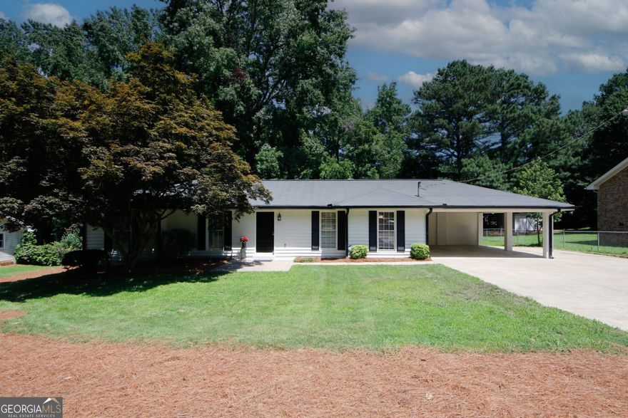 Rare find! Your dream come true! Completely remodeled home in award winning Brookwood school district with large level yard. Enter from the front porch to discover high beamed ceilings and beautifully refinished original hardwoods! The kitchen is complete with designer granite, subway tile backsplash, new SS appliances, painted white cabinets, large deep double wide SS sink and new faucet. New LVP flooring in kitchen, informal dining and formal dining. Informal dining has wall of windows and door for view of brand new deck and large flat back yard. All three bedrooms sport new neutral carpet. Both bathrooms have new cabinets topped with designer granite and trendy tile surrounds new bathtubs. All lighting and faucets are new. No HOA. Top it all off with fresh interior and exterior paint. Newer roof. What are you waiting for? Hurry before it is gone!