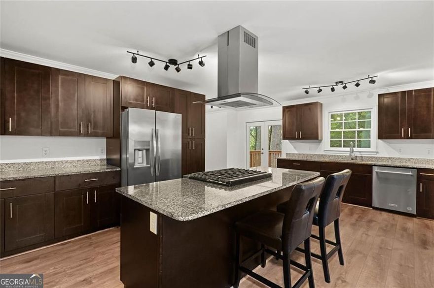 Welcome home to a beautifully rebuilt 3-bedroom, 2-bath ranch in the heart of desirable East Cobb, offering comfort, quality, and charm on a tranquil street. Fully reconstructed in 2022, this open-concept home blends modern finishes with timeless appeal and is move-in ready with no updates needed.  Inside, bright, freshly painted interiors and new rich flooring invite you into a spacious living area. An updated kitchen and pristine baths complement comfortable living on the main floor. Downstairs, a partially finished daylight basement awaits-fully stubbed for a bathroom-offering endless potential for a media room, workout space, or guest suite while maximizing functional living space.  Outside, the large, private yard is a true retreat (lot is much larger than the records show) perfect for weekend barbecues, playtime, or peaceful mornings under the sky. The new driveway adds to the homes' pristine, welcoming curb appeal. No HOA fees! Must See!   Situated within the highly acclaimed Walton High School district, recognized among the top public high schools in Georgia, this home also feeds into Dodgen Middle School and Murdock Elementary. With easy access to I-75, the location effortlessly connects you to a wealth of shopping, dining, and recreation East Cobb is famous for.  2674 Skylane Drive offers an unbeatable combination: a fully modernized, move-in ready home, a full basement, a peaceful yet connected location, and access to top-tier schools. Come see why this one feels like home from the very first step.