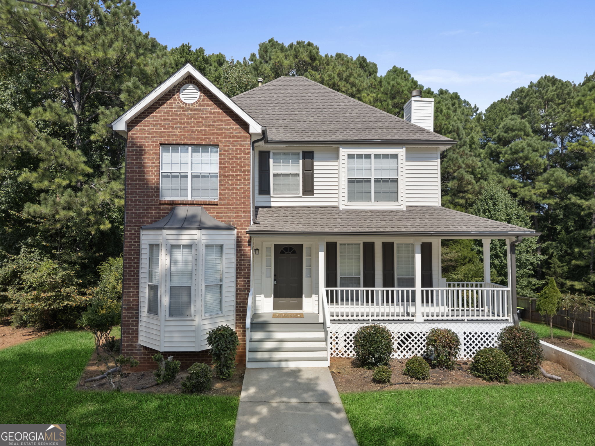 Tucked into a quiet, beautiful, well-maintained neighborhood, this 3-level home offers more than just living space - it offers flexibility, warmth, and a lifestyle that fits right in with both everyday living and space to create. On the main level, the living room invites you in with a cozy fireplace, creating a perfect space for quiet evenings or gathering with friends. Natural light fills the space during the day and just off the living area, step outside onto a private deck - perfect for lazy Sunday mornings, weekend entertaining, or simply a quiet moment with a good book enjoying your coffee. Outside, the backyard surprises with peach and pear trees - a delightful touch for anyone who appreciates fresh, homegrown fruit. Upstairs, you'll find all 3 bedrooms thoughtfully arranged, including a primary suite with a spacious walk-in closet. The layout keeps rest and relaxation upstairs while keeping everyday life flowing downstairs. The garage sits on the lower level, but there's more here than meets the eye. With inside and ground level entry, for the crafty or creative homeowner, this space is filled with possibility - whether you dream of a workshop, home studio, gym, or even a secondary living area, the potential is already built in. Outside your door, the neighborhood offers even more: community pool, tennis courts, and access to nearby golf, not to mention easy proximity to parks, shopping, and schools. It's a comfortable place to settle in and call home. Schedule your showing today!