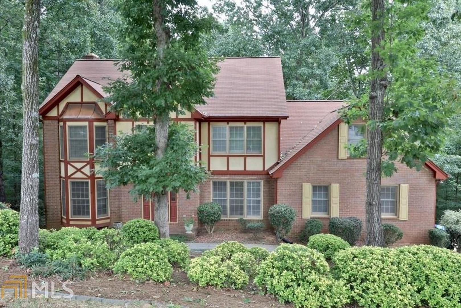 4 miles from Amazona???s first robotics fulfillment center in Georgia. Lease Purchase Available. Welcome home to your beautiful 4 sided brick executive home. Custom builder quality throughout. Master retreat upstairs w/sitting area & spa-like master bath. 3 more bedrooms & full bath up. Beautiful eat-in kitchen & separate dining & living rooms for entertaining. In-law suite in finished basement featuring family room w/fireplace, bedroom, full bath, office, & more. Large Lot partially fenced. Double Staircase. This home has tons of space.
