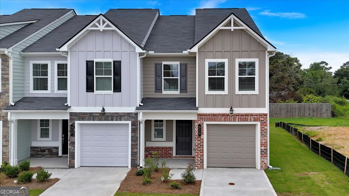 Move-in ready and full of charm, the Crape Myrtle at Village Green is a well-designed 3-bedroom, 2.5-bath new construction END UNIT townhome. The open-concept main level features LVP flooring, a stylish kitchen with 36 inch cabinets, quartz countertops, tile backsplash, and a spacious island with overhang-perfect for entertaining or everyday living. All kitchen appliances are included for added convenience. Upstairs, the private primary suite offers a spa-like bathroom with tile flooring, tile shower, double vanities, and 2 walk-in closets. Located in Adairsville with easy access to I-75, Village Green offers affordable, low-maintenance living with builder warranties and 100% USDA financing options available. Ask about up to $12,000 in builder-paid incentives when using our preferred lender.